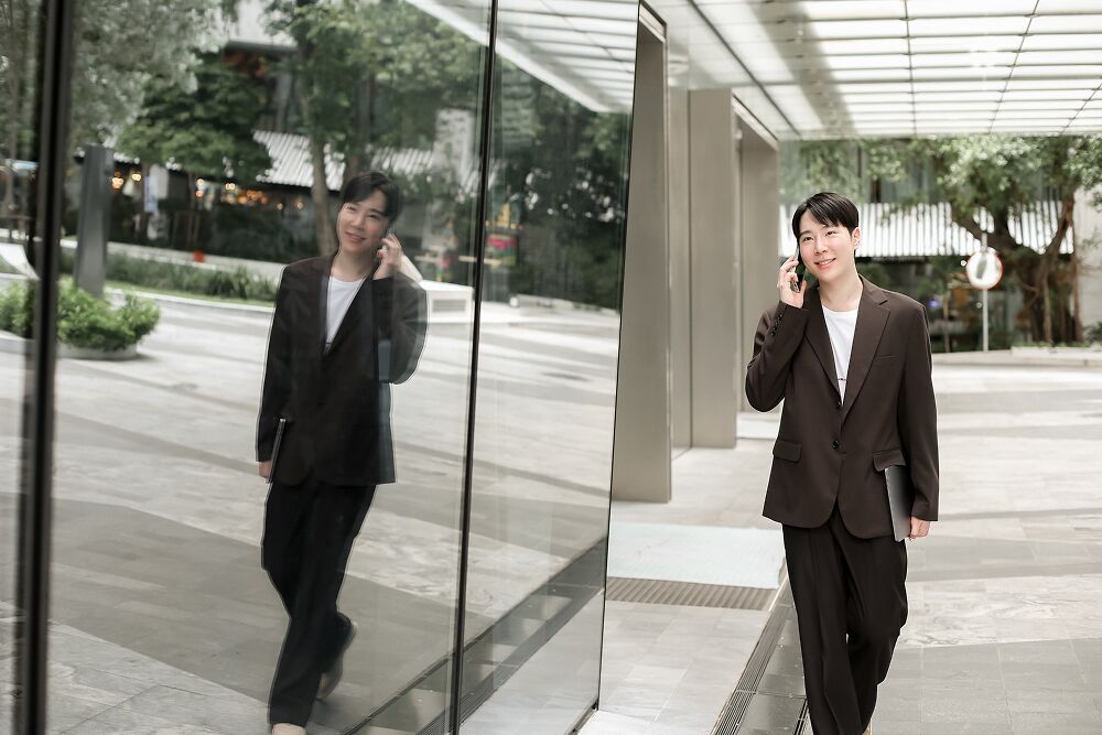 A Primal team member outside the Bangkok office